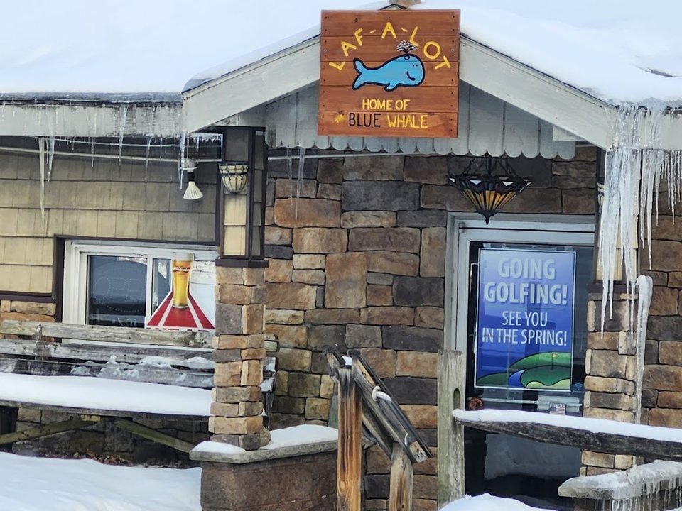Bar and grill dining room with lake view.